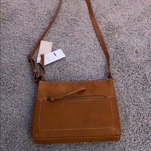a beautiful brown leather purse